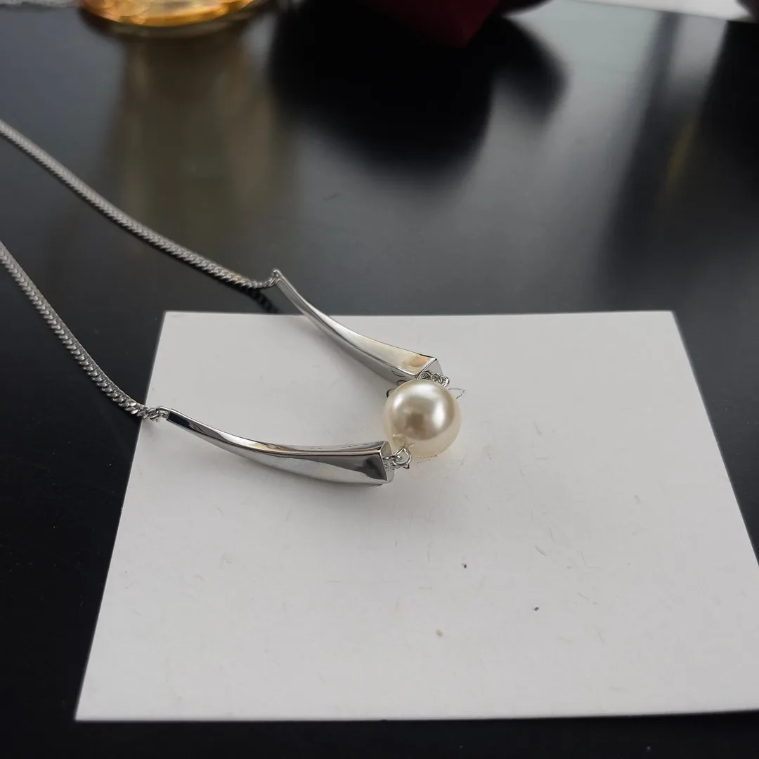 Aeris Orb – Sculpted Silver Pearl Choker